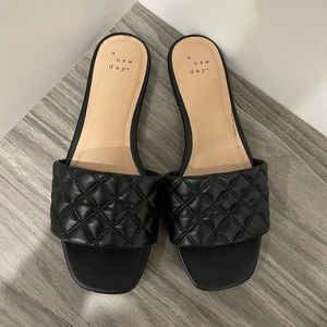 A new day ama quilted black leather slides